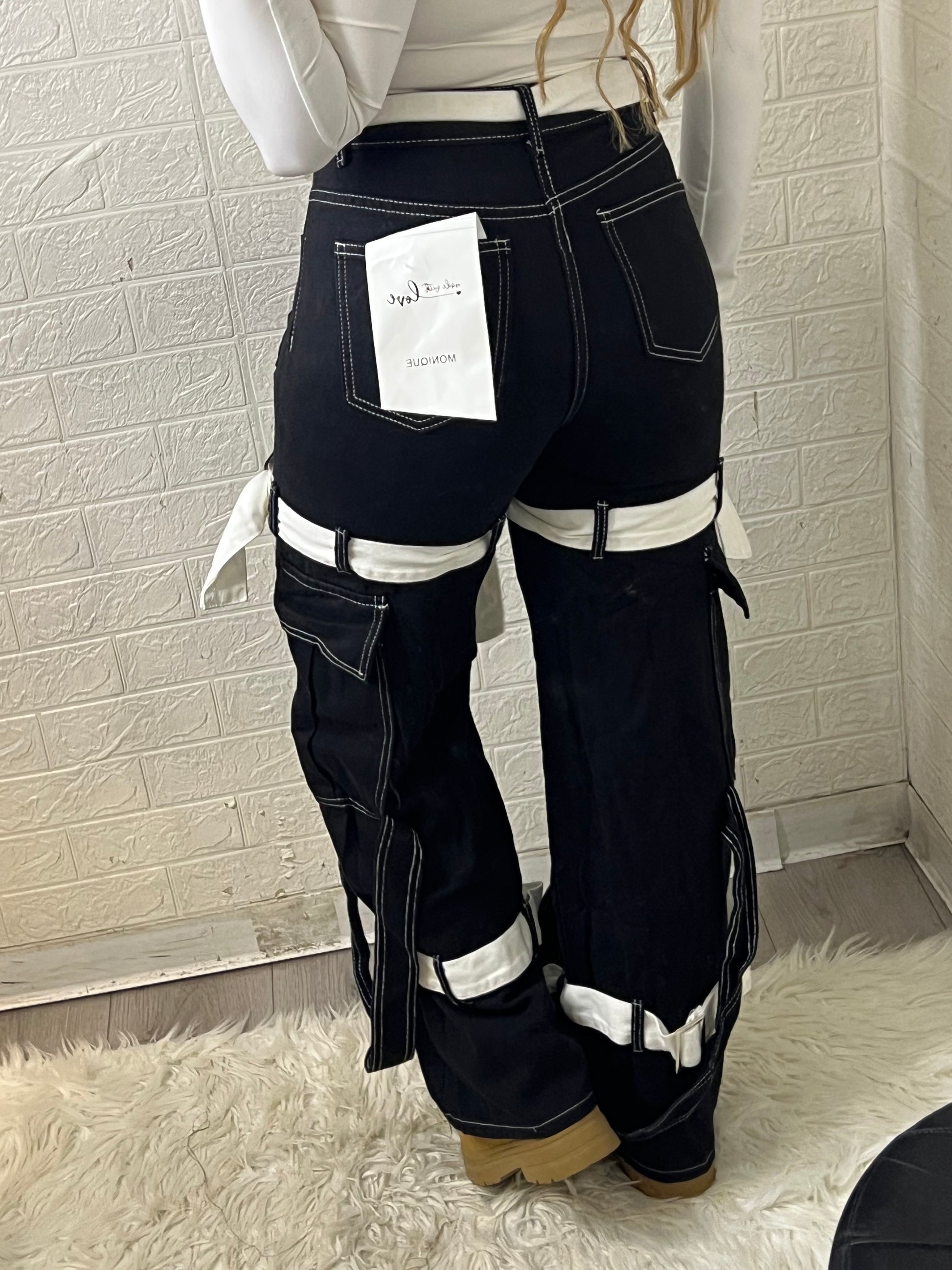 Jeans black con cinturini