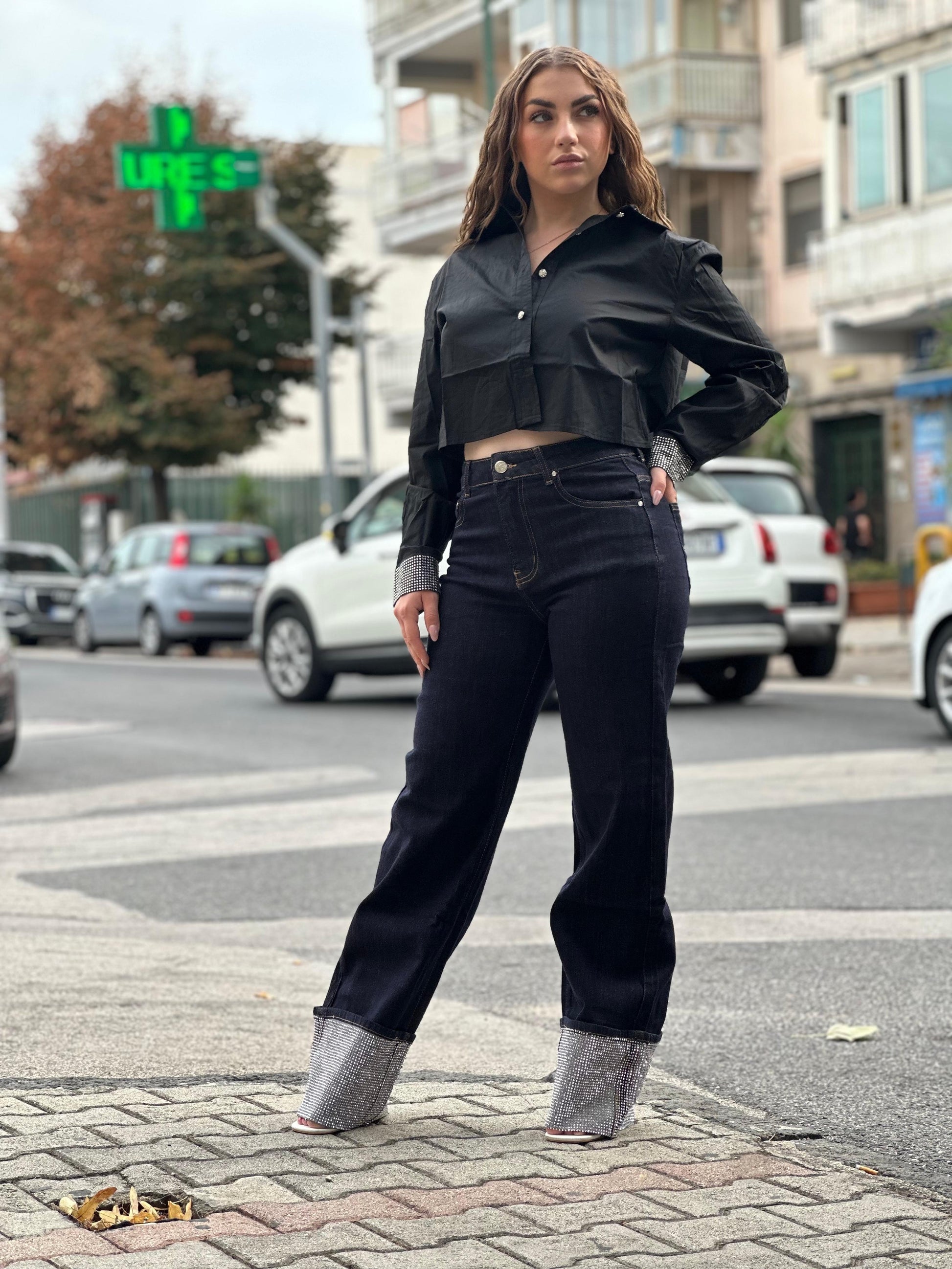 Jeans con piegone brillantinata