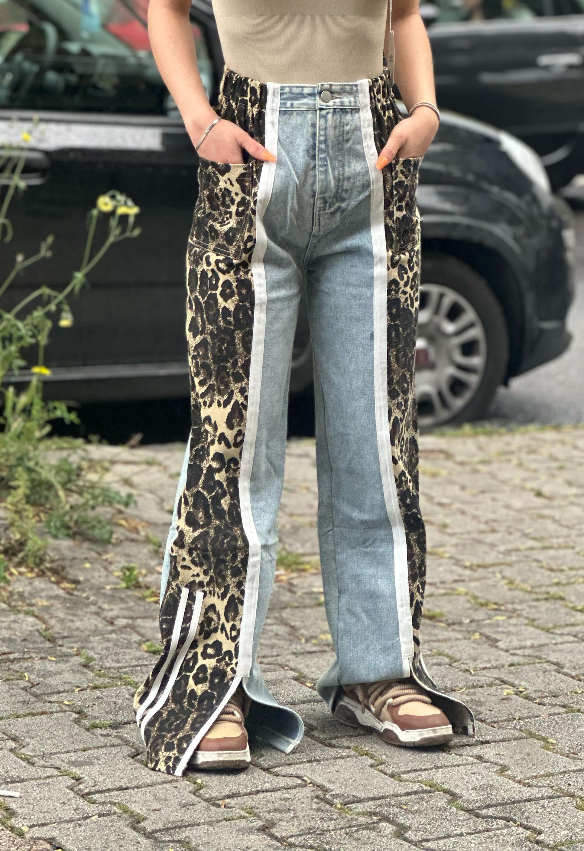 Jeans con banda laterale animalier