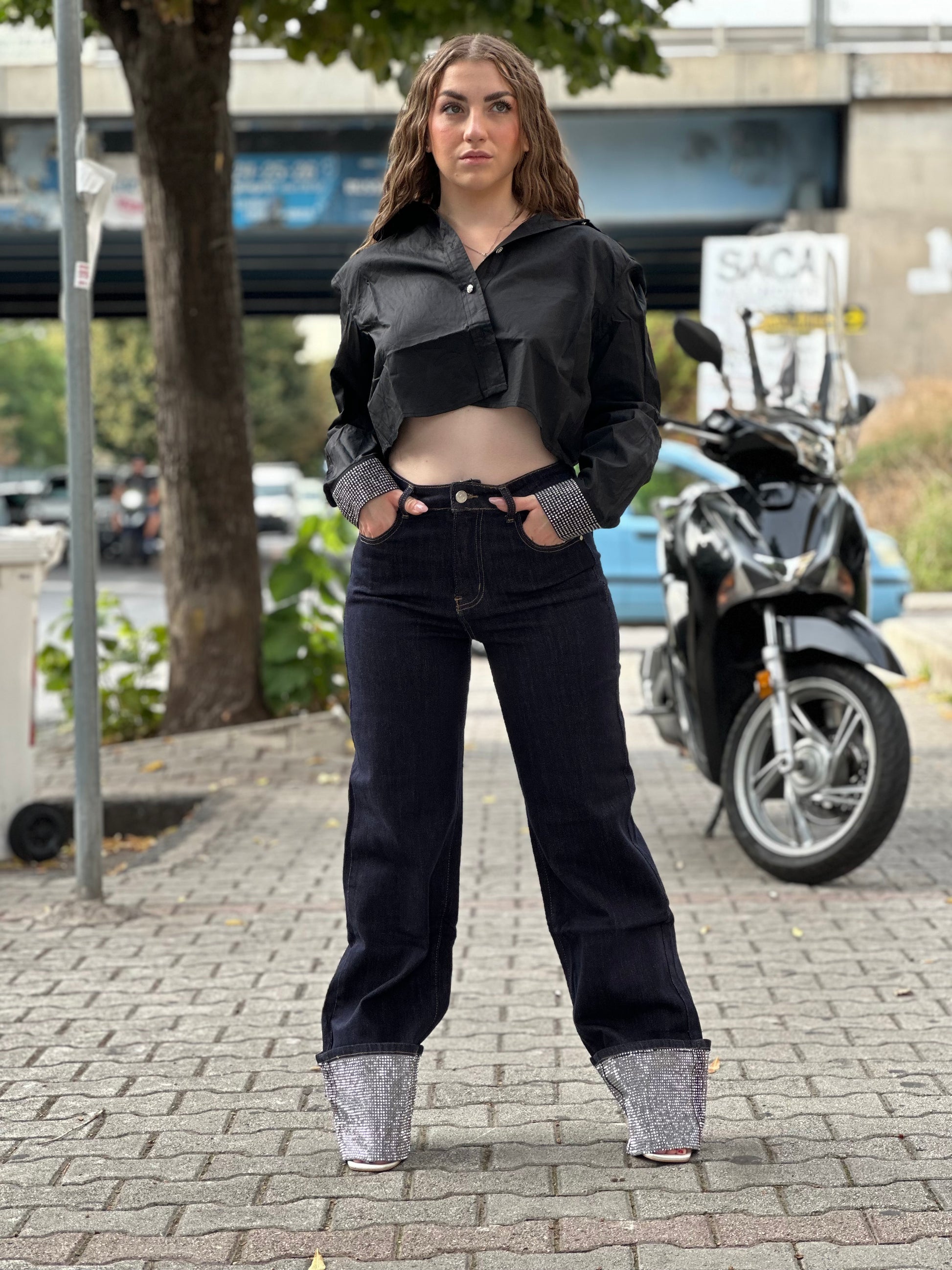 Jeans con piegone brillantinata