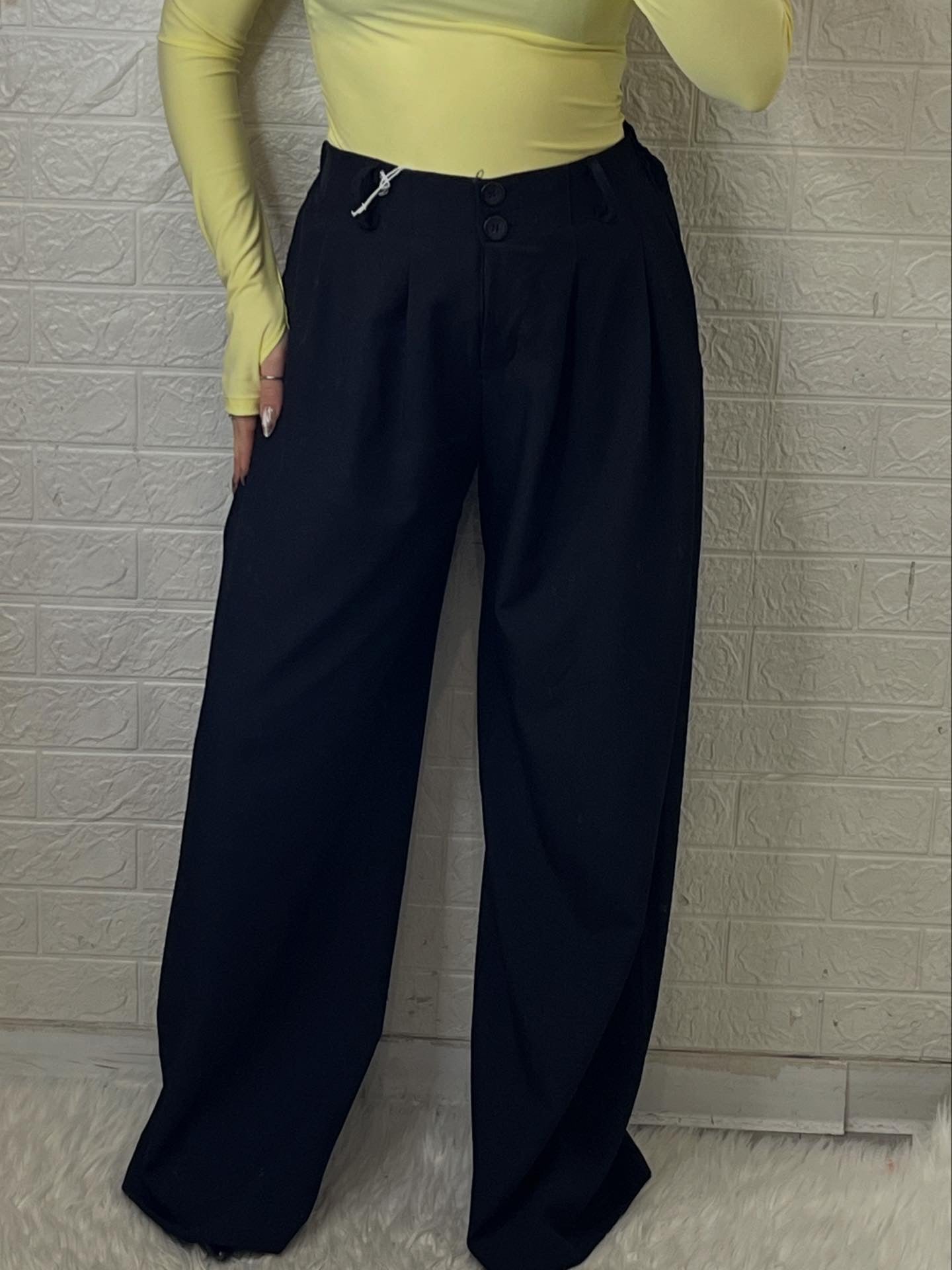 Pantalone con elastico e penche
